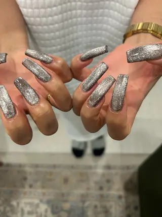 ネイル mellow:ｸﾙﾐ ﹡˖˟༝🎀˖˟ ༝のネイルデザイン