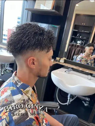 ミディアム パーマ メンズ 猪井 明のヘアスタイル