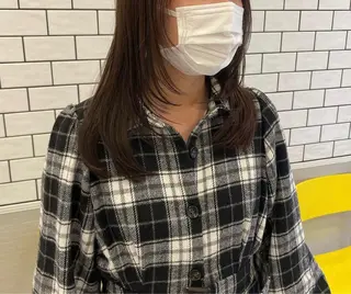 セミロング MIFA レイヤー／パーマのヘアスタイル