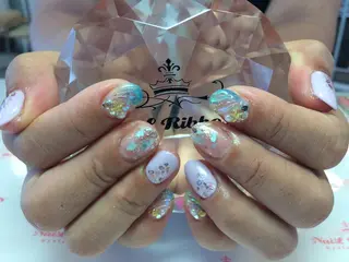 ネイル ネイルリボン 受付スタッフのネイルデザイン