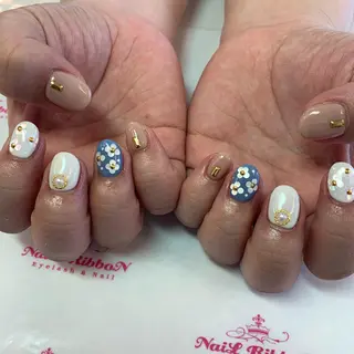 ネイル ネイルリボン 受付スタッフのネイルデザイン