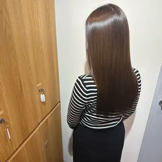 ロング 岡田 佳子のヘアスタイル