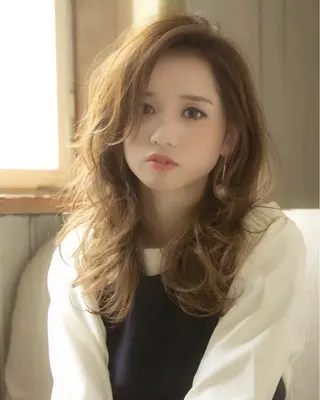 ミディアム 代表 吉澤弘哲のヘアスタイル