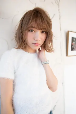 ミディアム 代表 吉澤弘哲のヘアスタイル