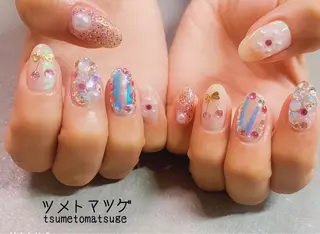 ミディアム ネイル ツメトマツゲ .のネイルデザイン