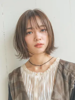 ミディアム HITOMI .のヘアスタイル