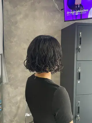パーマ 手塚 由佳のヘアスタイル