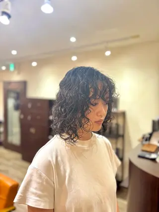 ミディアム パーマ 永作 真司のヘアスタイル