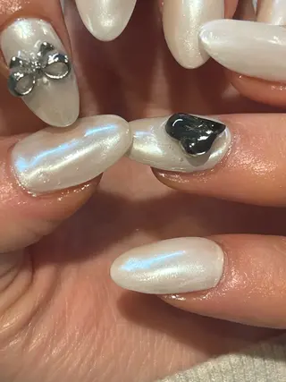 ネイル mellow:ｸﾙﾐ ﹡˖˟༝🎀˖˟ ༝のネイルデザイン