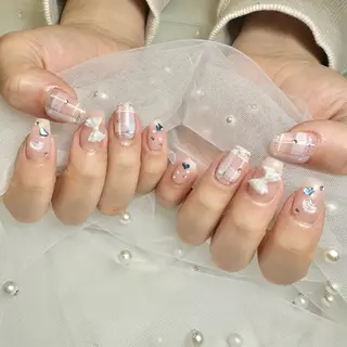 ネイル nami🐰🎀 ガーリー/堺筋本町のネイルデザイン