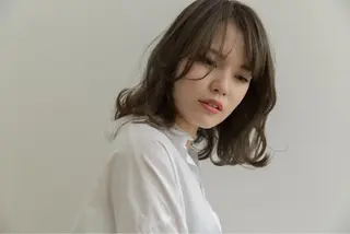 ミディアム ツジガキ ユウスケのヘアスタイル