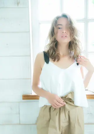 ミディアム 代表 吉澤弘哲のヘアスタイル