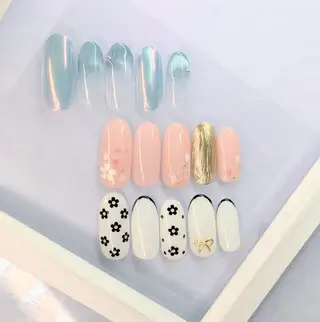 ミディアム imaichise 🧡💜推しネイルのネイルデザイン