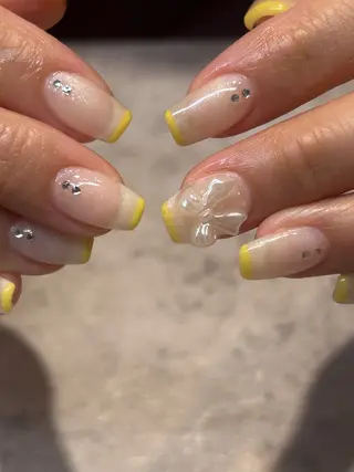 ネイル mellow:ｸﾙﾐ ﹡˖˟༝🎀˖˟ ༝のネイルデザイン