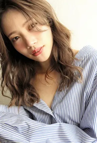 セミロング カラー コテ巻き風パーマ サトウタケル 表参道のヘアスタイル