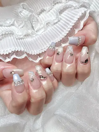 ネイル moca心斎橋店 Aina🐈‍⬛🤍のネイルデザイン