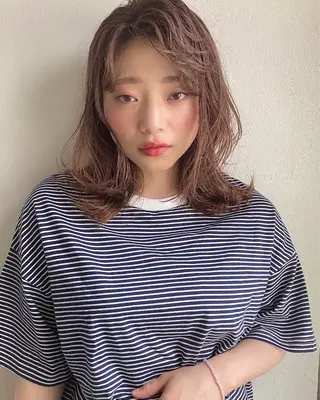 ミディアム 石川 理恵のヘアスタイル