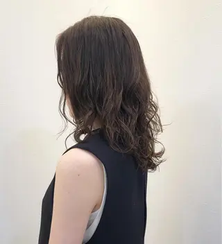 パーマ ツノガイ エリのヘアスタイル