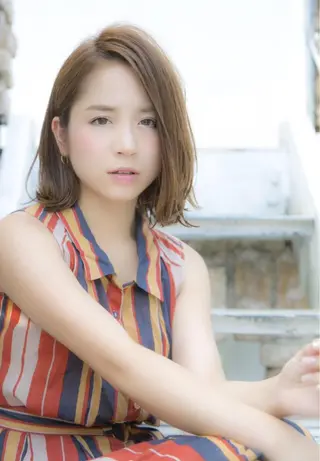 ミディアム 代表 吉澤弘哲のヘアスタイル