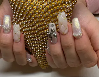 ネイル mellow:ｸﾙﾐ ﹡˖˟༝🎀˖˟ ༝のネイルデザイン