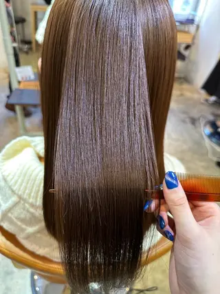 金 春江のヘアスタイル