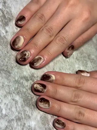 ネイル Mahiru ➰🎀🤍のネイルデザイン