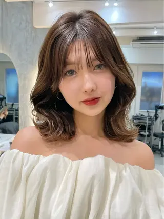 ミディアム 本田 奈穂美のヘアスタイル