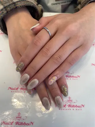 ネイル ネイルリボン 受付スタッフのネイルデザイン