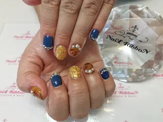 ネイル ネイルリボン 受付スタッフのネイルデザイン