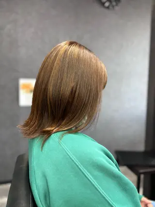 ミディアム 安田 恵のヘアスタイル