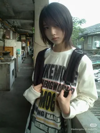 ミディアム YUUKI/ウルフ .ハイレイヤーのヘアスタイル