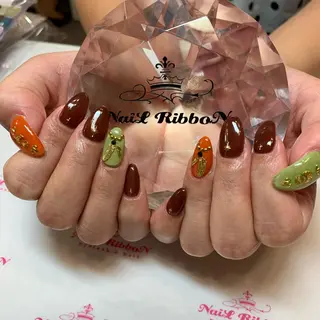 ネイル ネイルリボン 受付スタッフのネイルデザイン