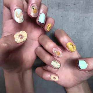 ネイル mana 暖色カラーカットのヘアスタイル