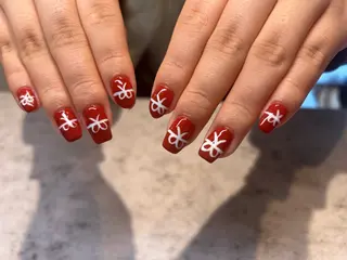 ネイル mellow:ｸﾙﾐ ﹡˖˟༝🎀˖˟ ༝のネイルデザイン