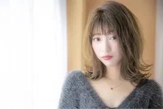ミディアム 代表 吉澤弘哲のヘアスタイル