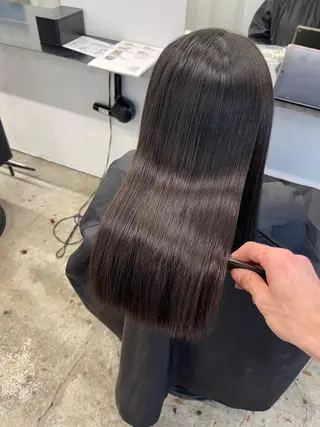 ロング パーマ TAKUMI .のヘアスタイル