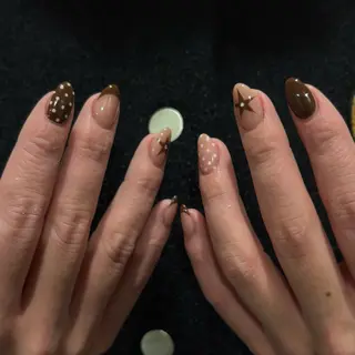 ミディアム minuit RIO🪽のネイルデザイン