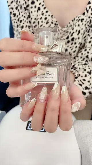 ロング カラー ネイル Petite Cannelleのネイルデザイン