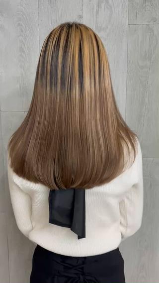 後ろに厚みを残したレイヤースタイル 