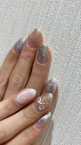 頂いたイメージから、透明な透け感、リボン、薔薇のモチーフをふんわりした優しい雰囲気でまとめました。

#薔薇#リボン#リボンネイル#マグネットネイル#ピンクネイル#おまかせデザイン#おまかせアート#おまかせネイル#おまかせメニュー#ラメグラ 