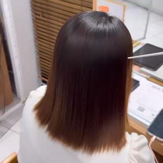 ダメージを最小限に抑えたホリスティック処方の縮毛矯正で究極艶髪へ