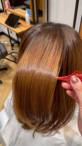 縮毛矯正で髪の広がりを抑えました 