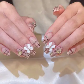 ネイル シュシュ 🎀 girly nailのネイルデザイン