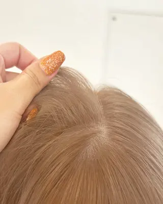 ミディアム 根岸 麻菜のヘアスタイル