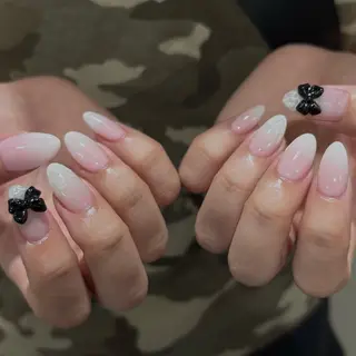 ミディアム minuit RIO🪽のネイルデザイン