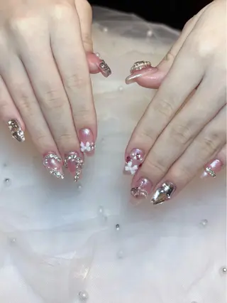 ネイル 村上莉理 ネイリ ストUNELMA所属のネイルデザイン