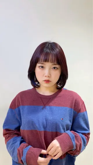 カラー JADE -zero- with AKROS所属・JADE海璃 波巻きパーマのヘアスタイル