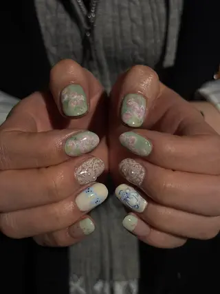 ネイル AMRITA omotesando所属・艶カラー・:*個性派 ネイル🦋mire-のネイルデザイン