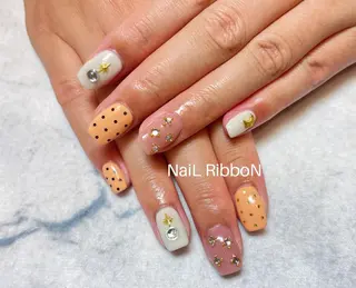 ネイル ネイルリボン 受付スタッフのネイルデザイン