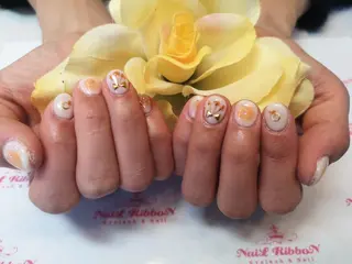 ネイル ネイルリボン 受付スタッフのネイルデザイン